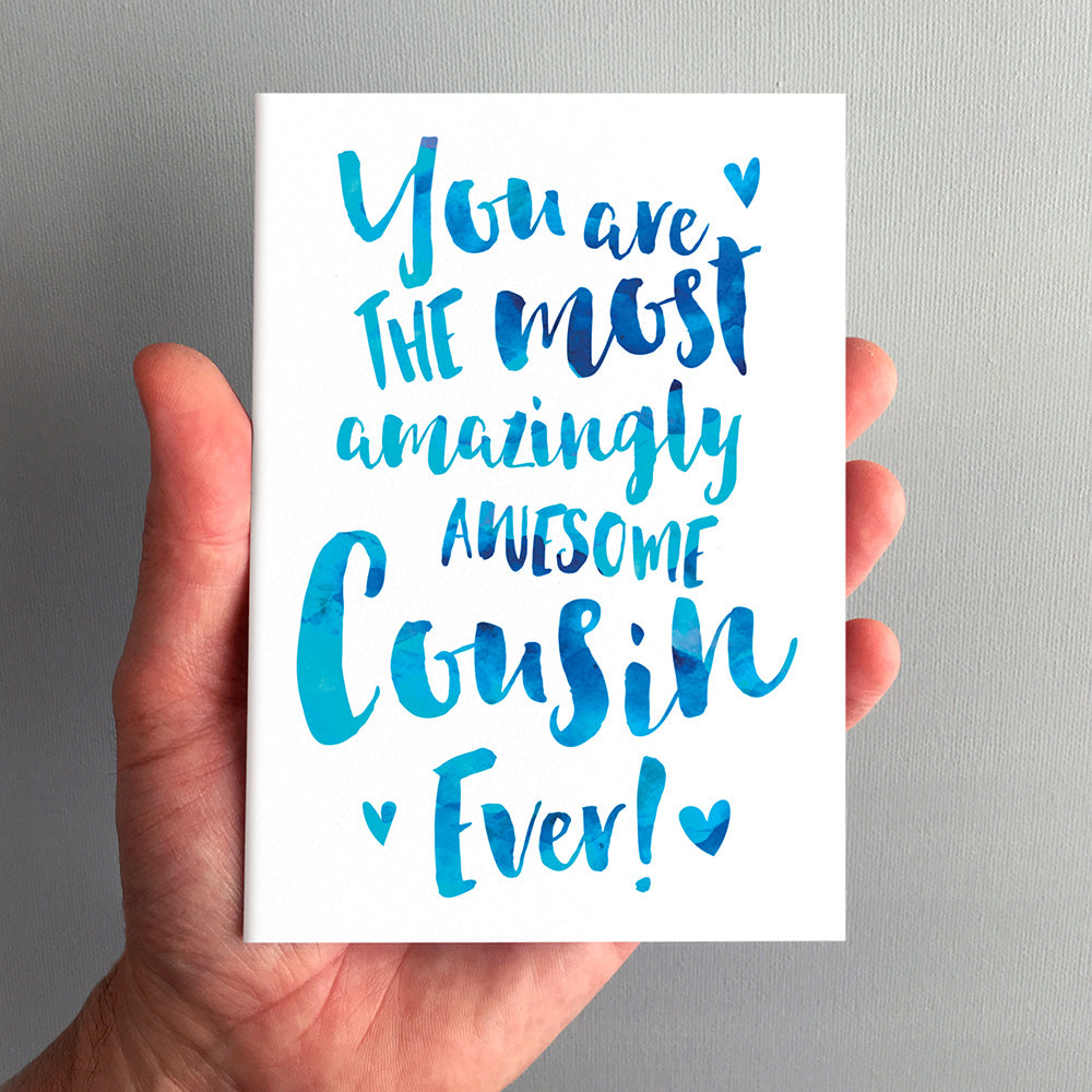 The Most Amazingly Awesome Cousin Greeting Card in Blue by Dig The Earth